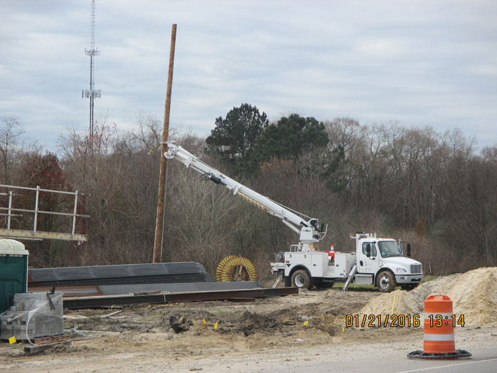 012516_ATT pole being installed on west side of Bilbo Canal wall.jpg